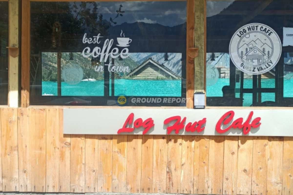 Log hut cafe with a view of Habba Khatoon peak