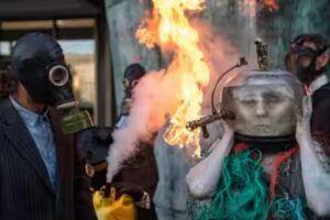 Climate activists 'drown' in oil, gas, and flames in shocking protest