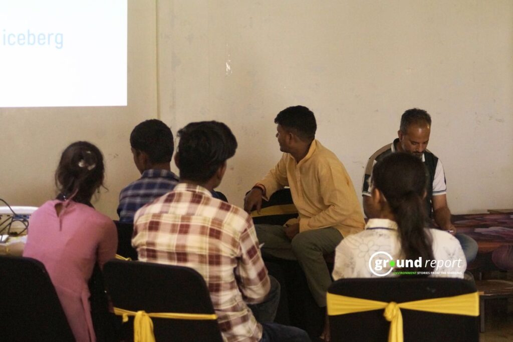 Dangi leads a youth workshop on child rights in Rajgarh.