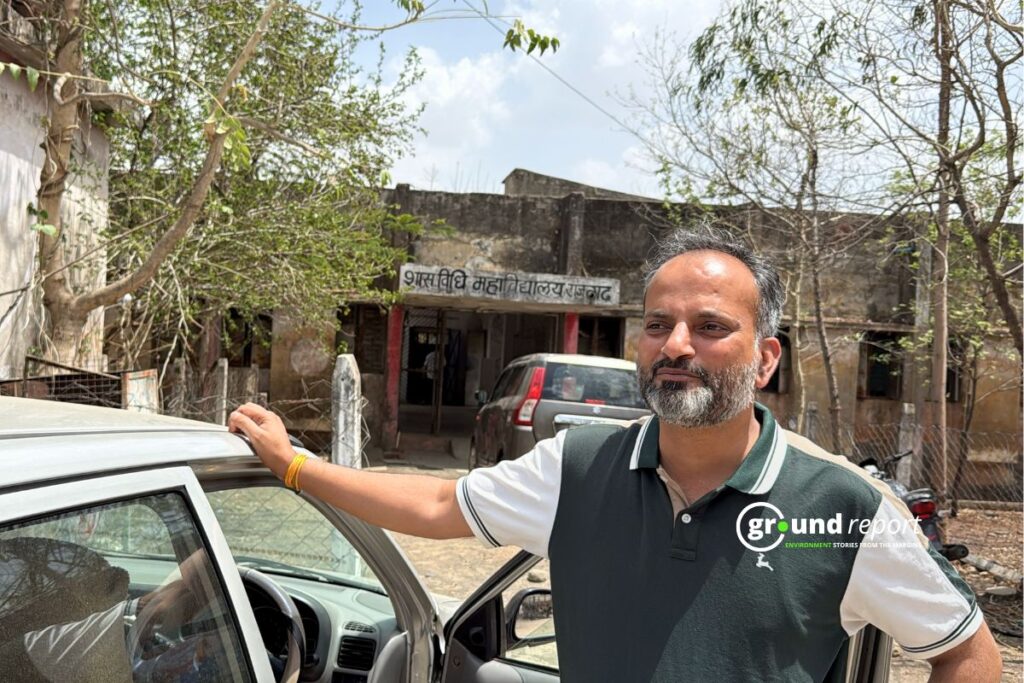 Arun standing outside the government college in Rajgarh, which also serves as Ahimsa’s office.