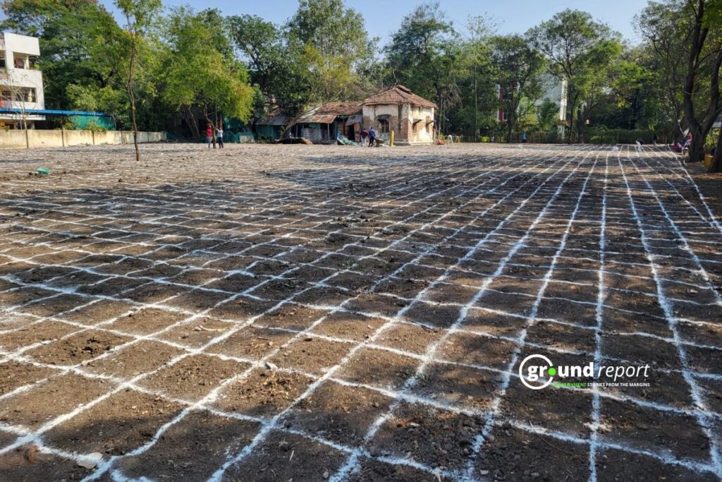 Workers mark the planting grid on the prepared ground at SGSITS, Indore. Each square will hold a sapling as part of the Miyawaki dense-planting method.