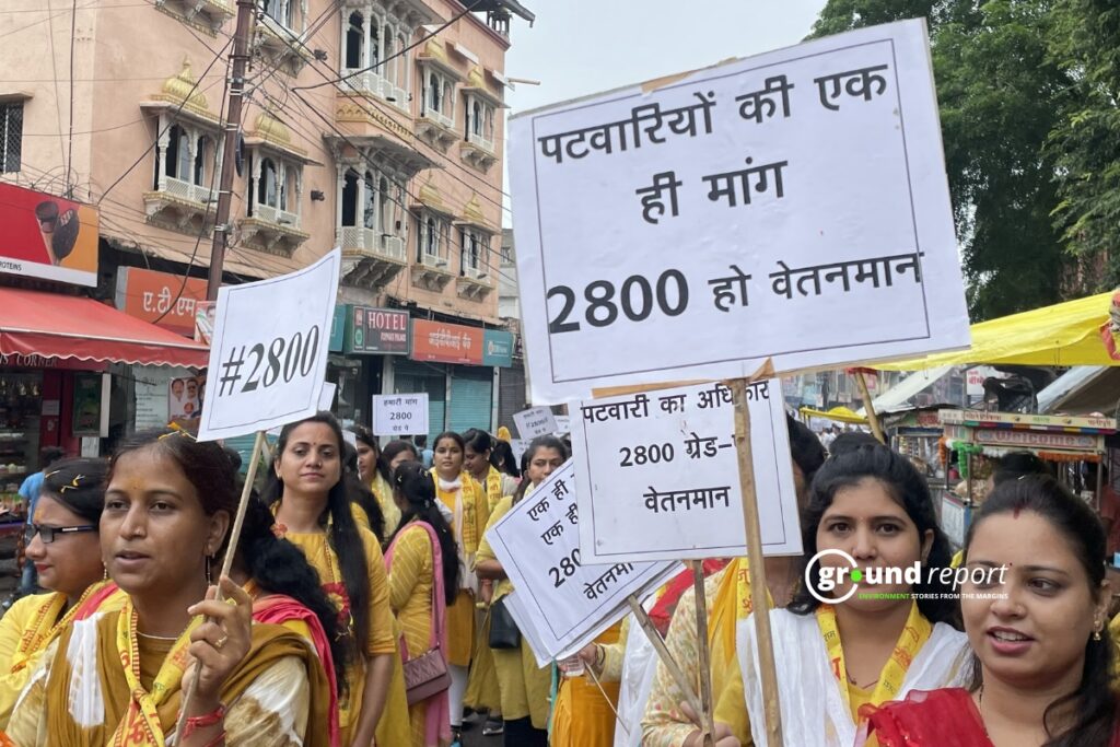 Patwaris march with placards demanding a Grade Pay of 2,800, one of the association's key demands.