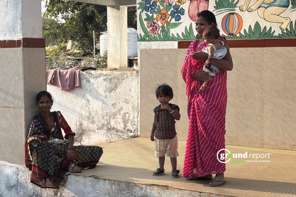Mothers and young children outside a rural health facility. Women like these are the ones the task force's tea fortification plan is designed to reach first.