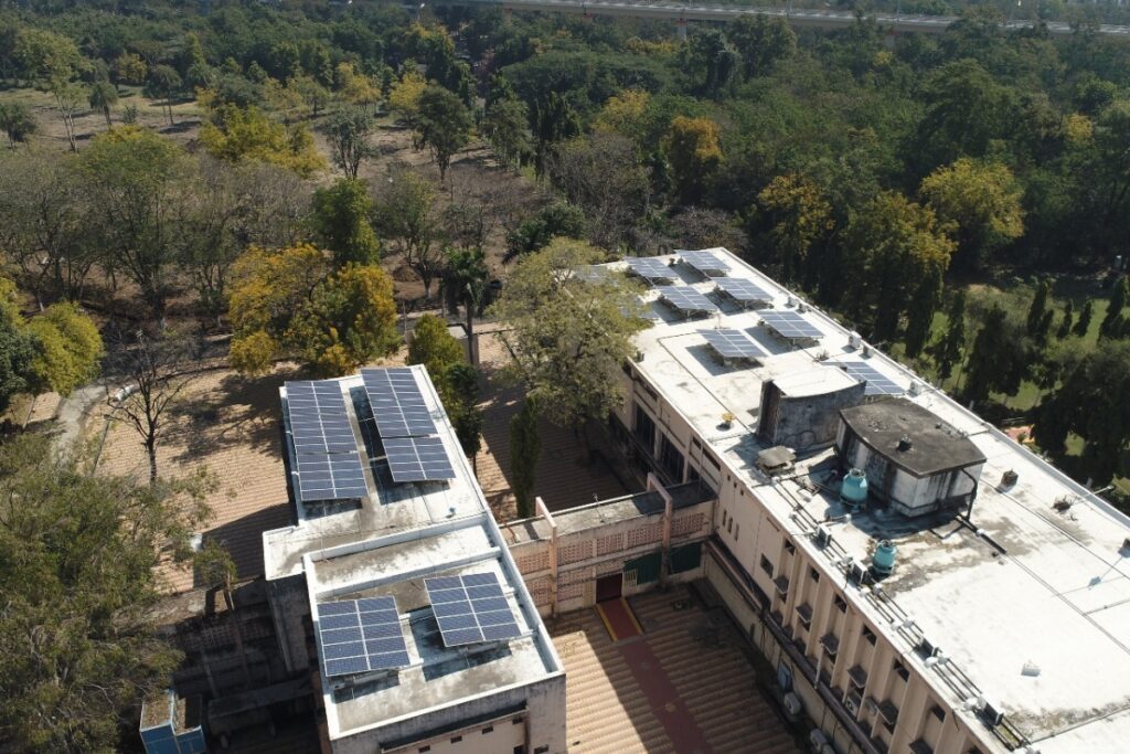 An Aerial View Shows Neeri's Buildings Surrounded by Dense Green Cover