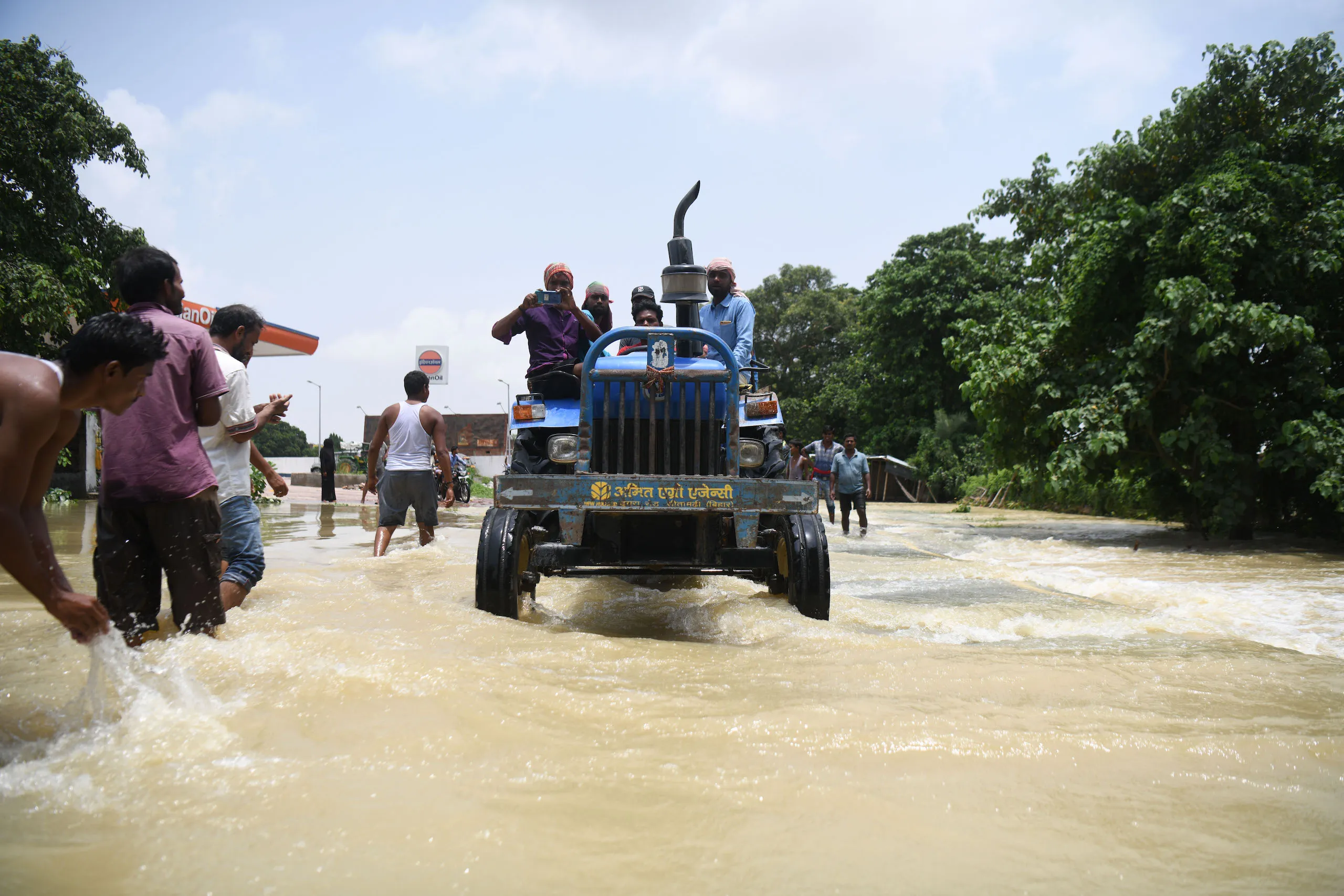 A tractor navigates floodwaters in Muzaffarpur, Bihar, Sachin Kumar