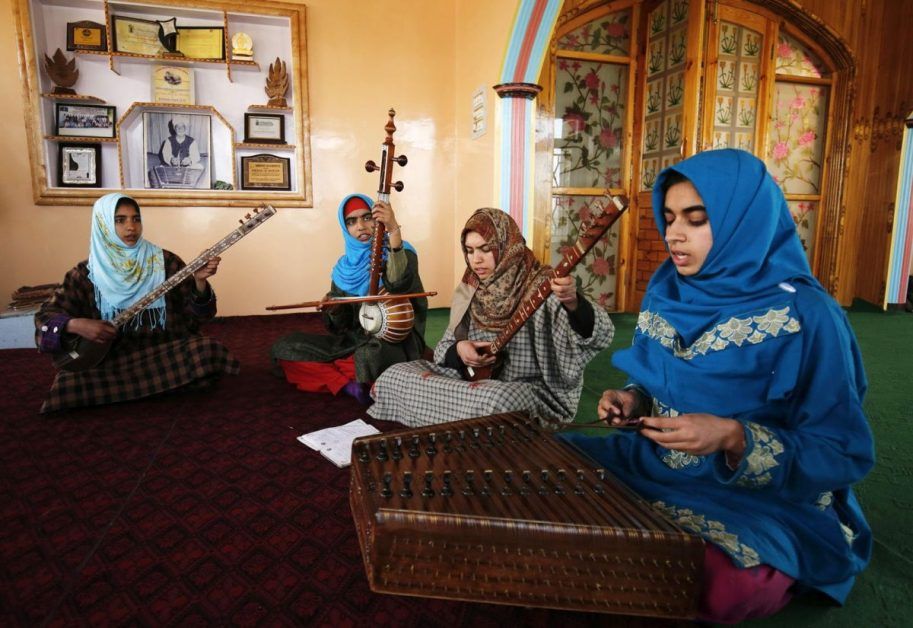 Girls protecting Kashmiri Sufi music