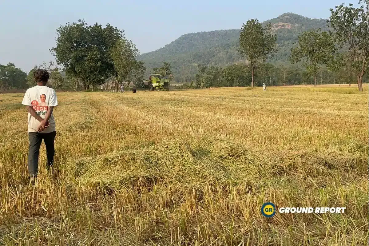 Man standing on his agriculture field in Madhya Pradesh Budhini. 