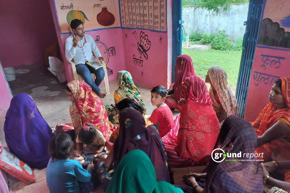 Janseva Mitra talking to women in Rural areas
