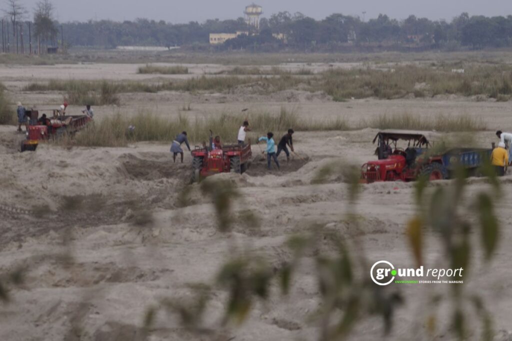 Trucks carry fly ash from the Kanti Thermal Power Plant, sending fine dust into the air and affecting nearby villages