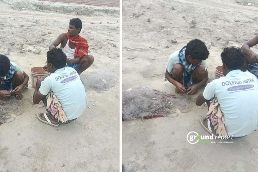 A Dolphin Mitra, along with other fishermen, collects fish caught in the net (Photo Credit: Special Arrangement)