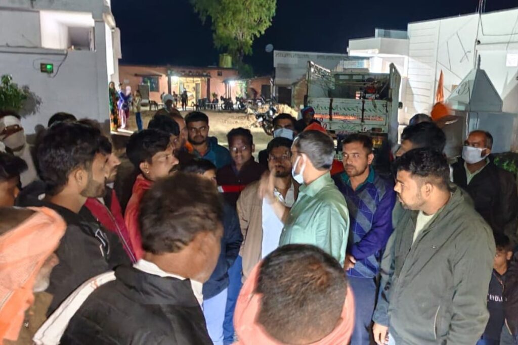medical officers giving advise to villagers