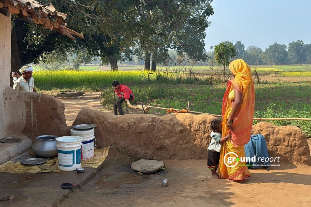 "Sonmati Bai participates in the protest movement against coal mining in Dhirauli, Singrauli, with her young children"