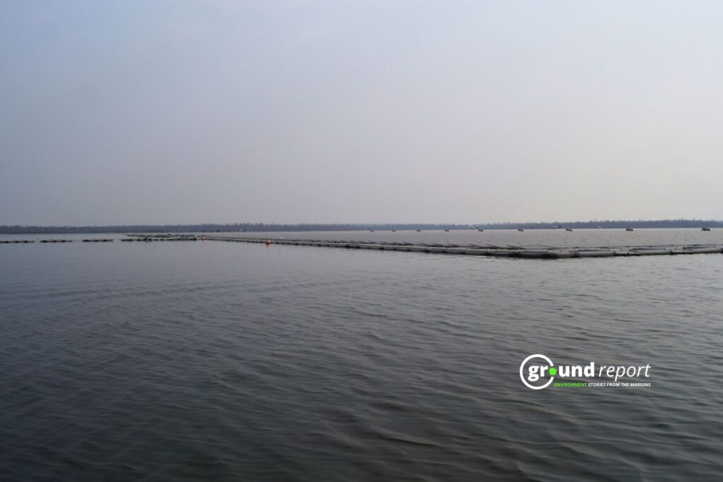 Floating structures sit on the Narmada as large quantities of milk were poured into the river during a ritual